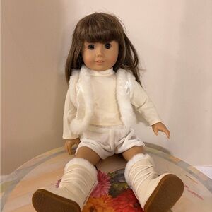 Stylish White and Brown Doll with Fur Vest